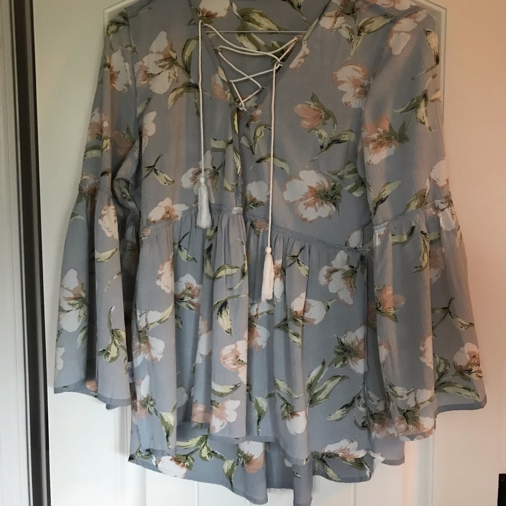 Beautiful light blue and floral bell sleeved top